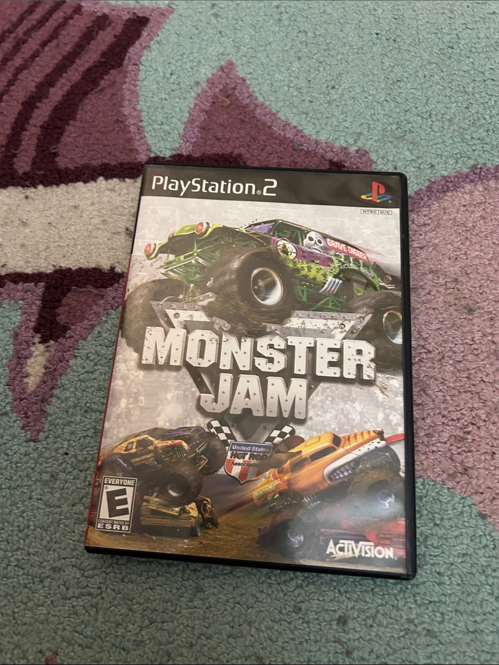 Sony PlayStation 2 Monster Jam — Black Case with Colorful Cover Art